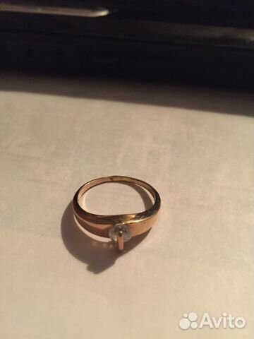 Золотое кольцо с подвижным цирконом