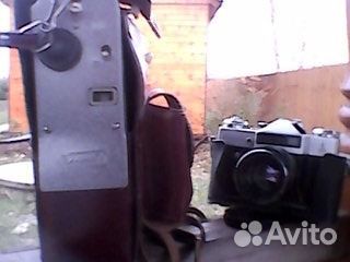 Фотоаппарат Зенит-Е с объективом и фотовспышкой Фотоаппарат Зенит-Е с объективом и фотовспышкой