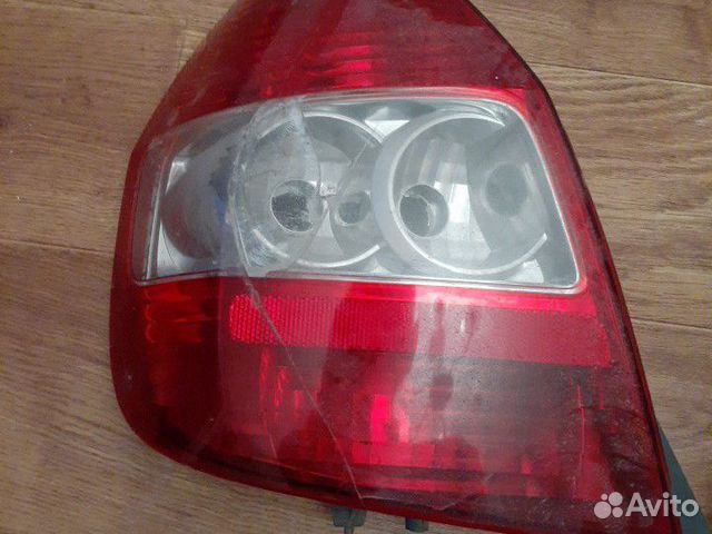 Фонарь задний левый на honda FIT