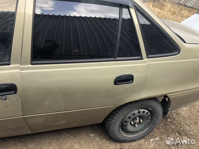 Дверь задняя левая золотая Деу Нексия