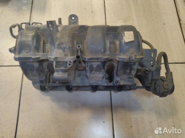 Коллектор впускной Opel Corsa D A12XER