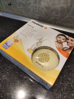Молокоотсос Medela Swing