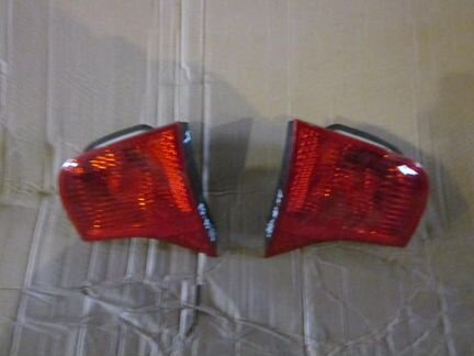Задний фонарь на крышку багажника Ауди А4 06-08гв